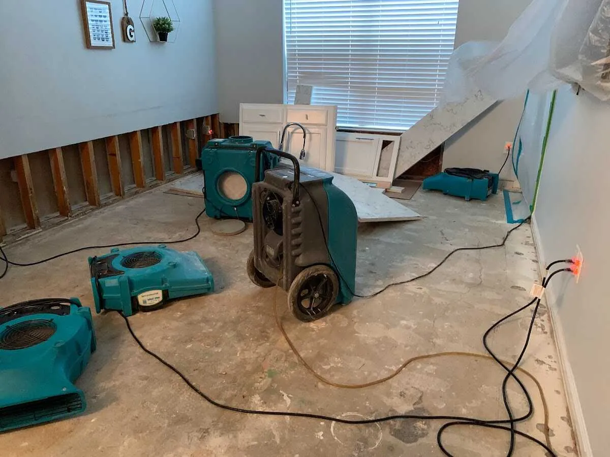 Dehumidifier in flood-cut room for Water Damage Restoration in Fallbrook